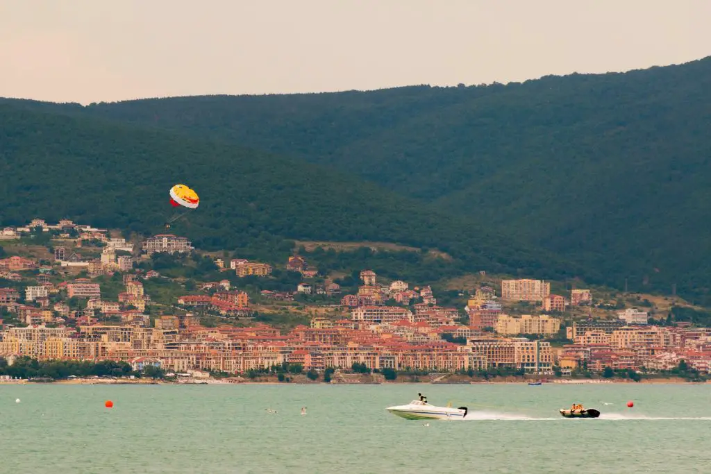 a person parasailing on the water